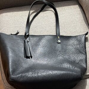 Portland Leather Black Tote with Tassel Accent